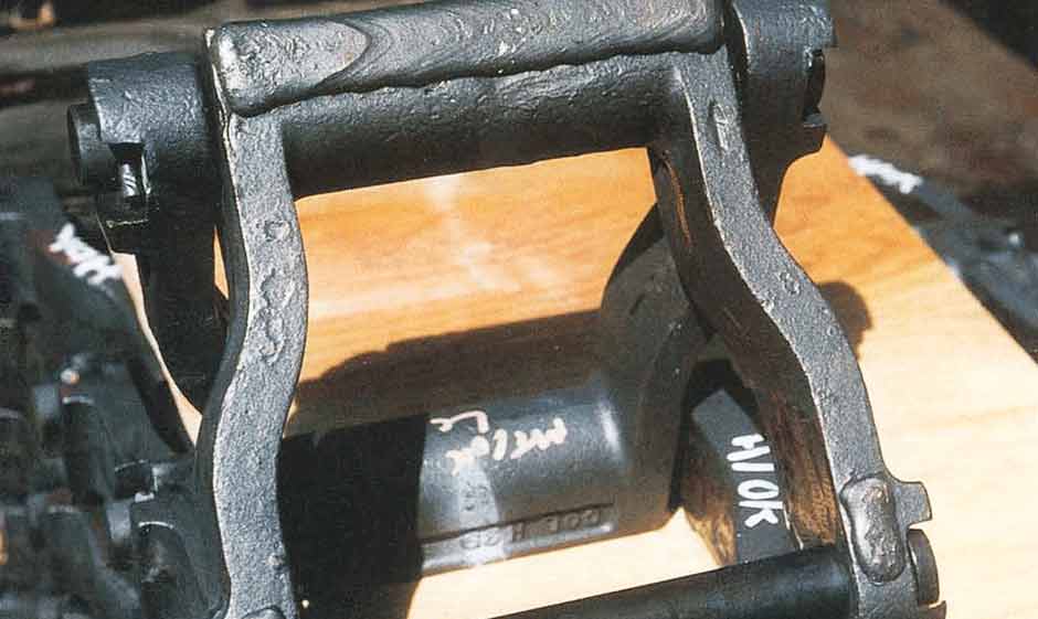 Factory-applied hardfacing on clinker drag chain.