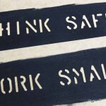 Stencils for equipment are a simple way to spread on-site safety messages.